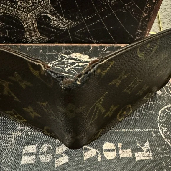 Louis Vuitton men’s multiple monogram wallet.